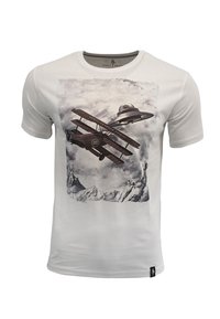 Weißes T-Shirt mit kurzen Ärmeln, das einen Grafikdruck eines Doppeldeckers und eines UFOs über Bergen zeigt, aus einem weichen Stoff mit normaler Passform.