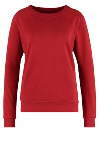 Rode sweatshirt met lange raglanmouwen, geribbelde ronde hals en geribbelde zoom. Gemaakt van zachte, gestructureerde stof voor comfort.