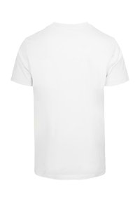 Balts kokvilnas T-krekls ar īsām piedurknēm, apaļu kakla izgriezumu un vienkāršu aizmuguri, ar gludu tekstūru un bez redzamām apdrukām vai logo.