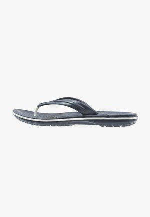 Marine flip-flopsandaler med teksturert fotbed, hvite aksenter på sålen og et to-farget stroppdesign for økt fleksibilitet.