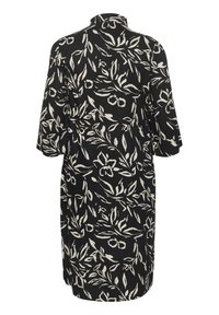 Schwarzes Kleid mit einem beige Blütenmuster, kurzen Ärmeln und lockerer Passform. Der Rücken hat einen Kragen und einen geraden Schnitt.
