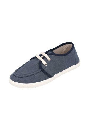 Zapato casual de tela azul marino con suela de goma blanca y cordones blancos, diseño de corte bajo y ribete oscuro alrededor de la abertura.