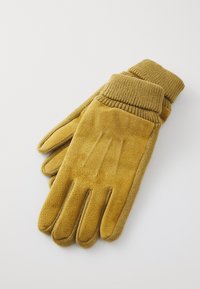 Gants marron en cuir texturé avec paumes et poignets en tricot côtelé. Des doigts à quatre coutures et un tissu lisse au dos améliorent l'adhérence et le confort.