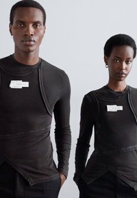 Feng Chen Wang DECONSTRUCTED PATCHWORK TROUSERS UNISEX - Trousers - black