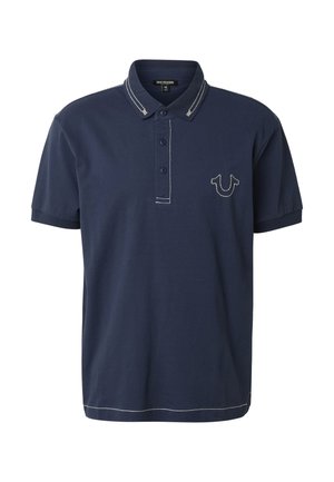 Polo blu navy a maniche corte con cuciture bianche sul colletto, sulla patta dei bottoni, sull'orlo e con logo a ferro di cavallo sul petto sinistro.