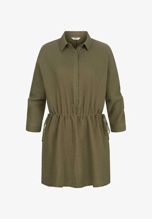 Olive green shirt dress made of textured fabric, featuring a button-down front, collar, three-quarter sleeves, and an adjustable drawstring waist.