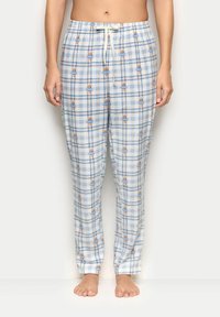 Lyseblåternet natbukser lavet af blødt stof med et mønster af små bjørne, med elastisk talje og justerbar snor.