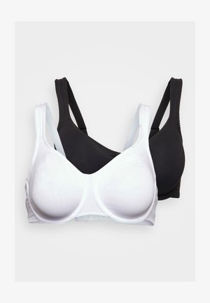 Se presentan dos sujetadores: uno blanco y otro negro. Ambos tienen una tela suave y lisa, tirantes ajustables y un diseño sin costuras con copas moldeadas.