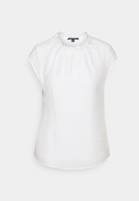 Top corto bianco a maniche corte realizzato in tessuto leggero, con scollatura arricciata e dettaglio a chiave sul davanti. Design liscio e semplice.
