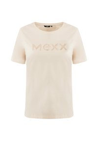 Kremowa bawełniana koszulka z krótkimi rękawami i okrągłym dekoltem. Zawiera logo "MEXX" w metalicznych akcentach. Gładka tekstura.
