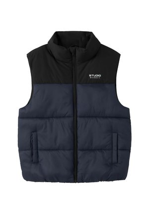 Ærmeløs polstret vest med sort øverste del og marineblå nederste del, lynlås foran, to lommer og "STUDIO Outdoors" logo på brystet.