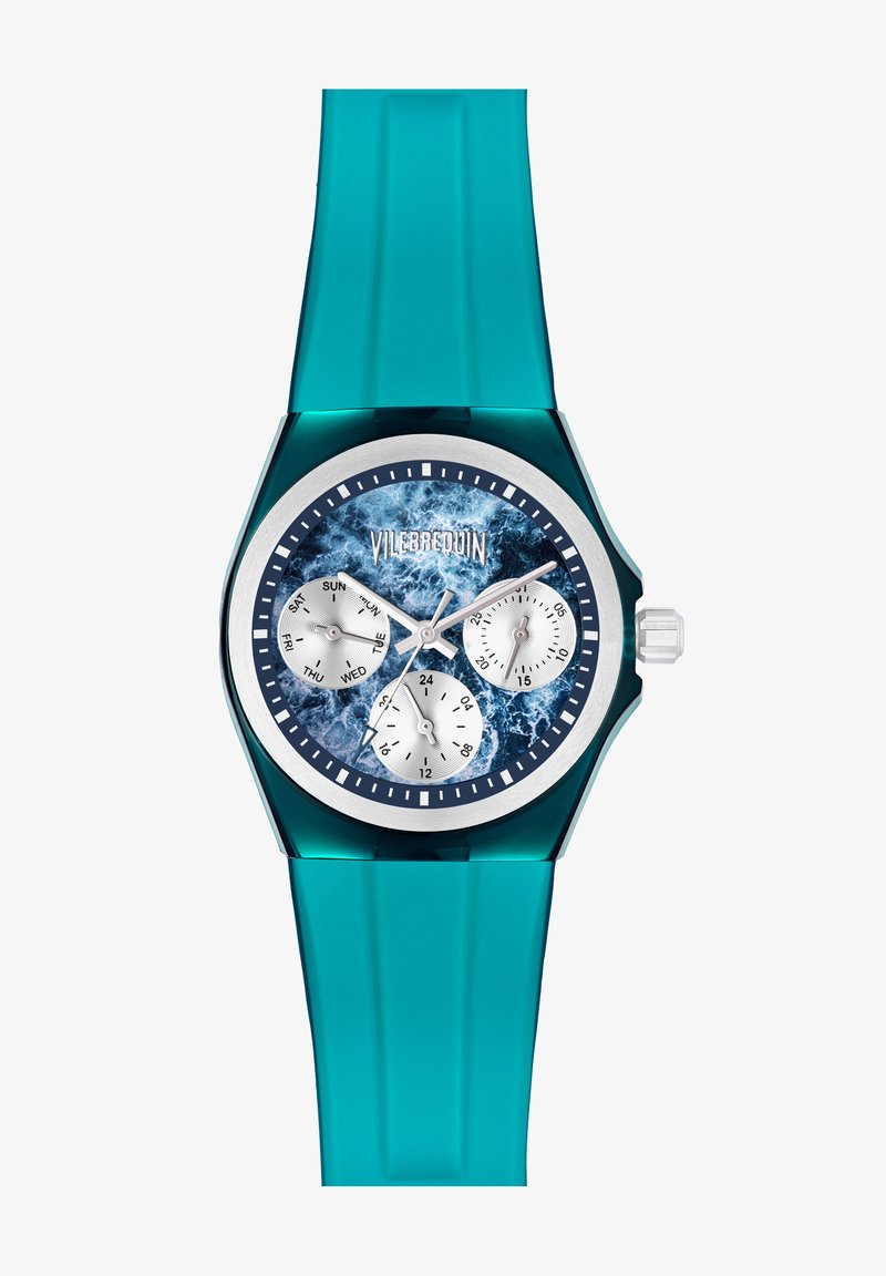 Reloj de silicona azul y verde azulado con una esfera redonda, que presenta una esfera con patrón de olas, marcadores de hora plateados y tres subesferas para el seguimiento del tiempo.