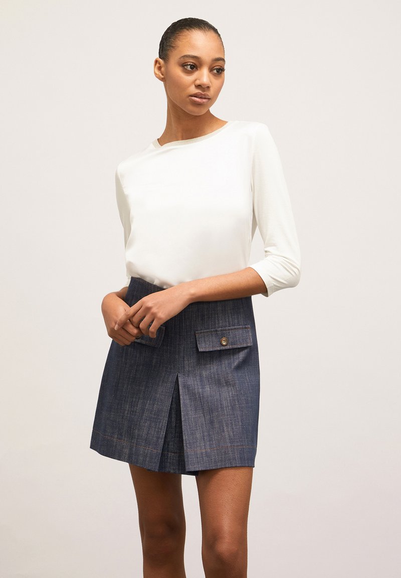 Blusa Business fort, a manica lunga bianco