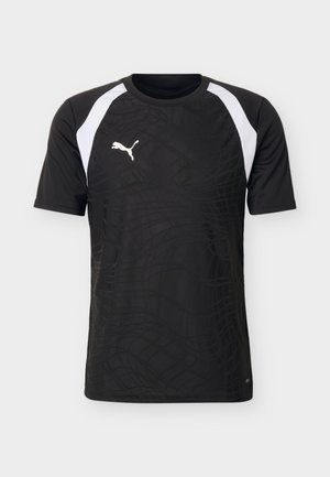 Sort sportstrøje med korte ærmer, hvide skulderpaneler og subtilt geometrisk mønster, med et hvidt Puma-logo på brystet.