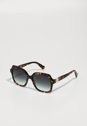Ochelari de soare cu model țestoasă, de formă hexagonală, cu lentile gradient și accent de aur pe sprâncene. Fabricate dintr-un material plastic ușor.