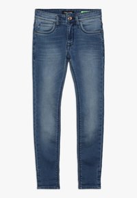 Úzké džíny z denimu ve středně modré barvě. Mají pět kapes, přední zapínání na knoflík a tónované švy. Viditelné poškozené detaily.