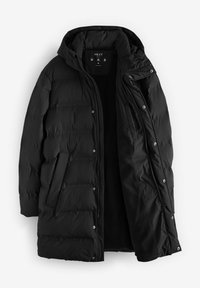 Chaqueta de plumas negra con capucha, con cierre de cremallera, botones de presión y bolsillos laterales. Tejido texturizado con secciones acolchadas.