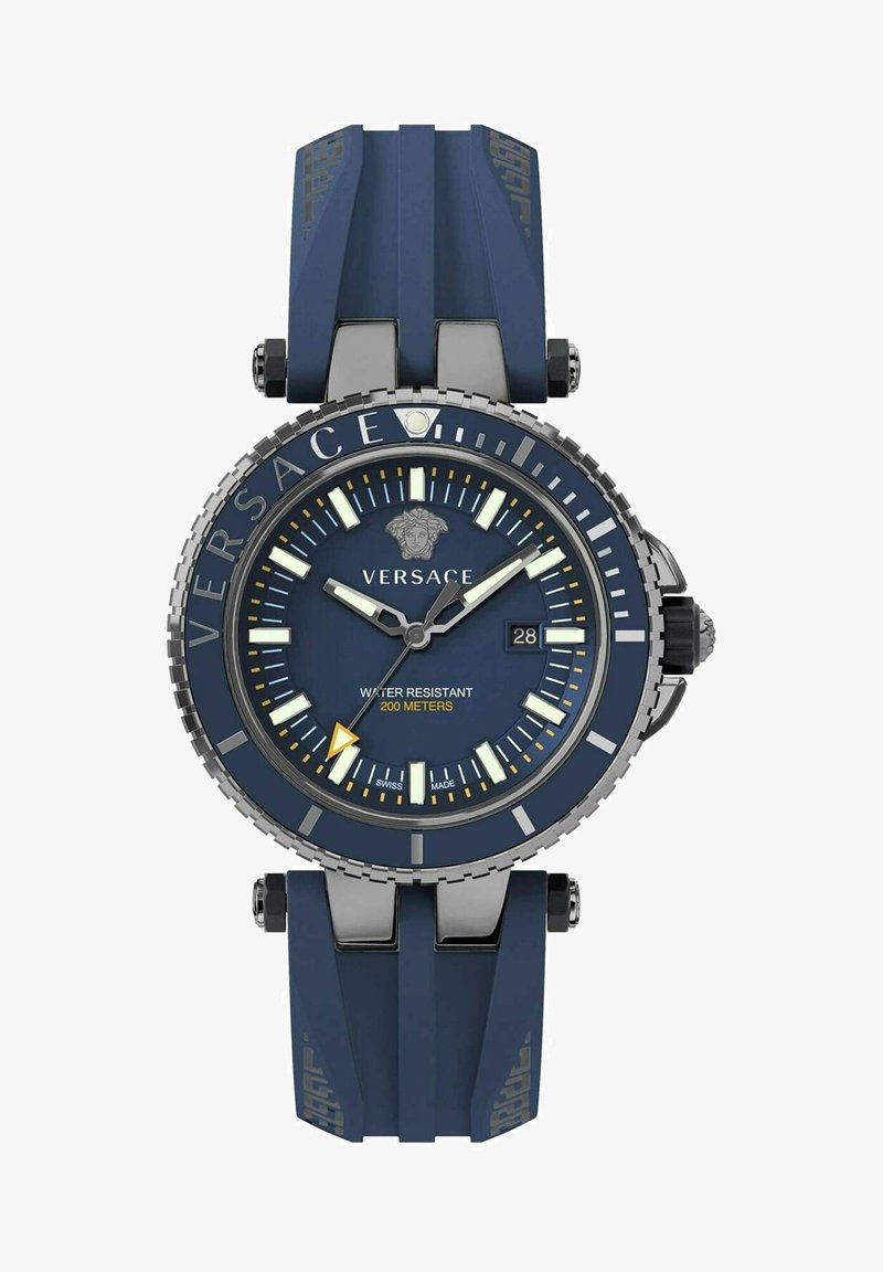Navy rubber watch with stainless steel accents, a textured bezel, and a round dial featuring luminous hands, date display, and a Medusa logo.