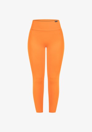 Legginsy z wysokim stanem w jaskrawym pomarańczowym kolorze, wykonane z elastycznego materiału. Gładka tekstura bez widocznych szwów dla uzyskania eleganckiego wyglądu.