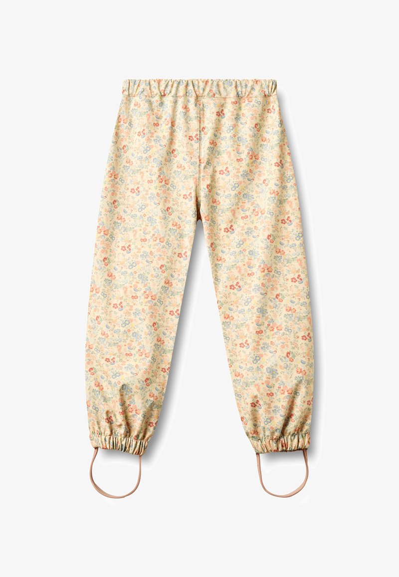Pantalon à motif floral jaune clair avec taille et poignets élastiques, doté de lanières de sangle aux chevilles pour un maintien sûr.