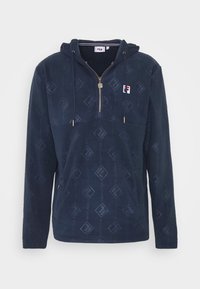 Pullover in pile blu navy con zip a metà, tasca frontale a sacco e cappuccio con cordoncino. Presenta un motivo a diamond discreto e un dettaglio con logo.