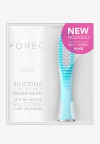 Foreo ISSA Hybrid Wave børstehodet, silikon og PBT-polymer, i lyseblå med teksturert overflate; pakket i klar plast med en rosa etikett.