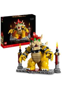 LEGO Bowser figure, primarily yellow with green, red accents; detailed face with spikes, horns, black collar, and flame torch stand.