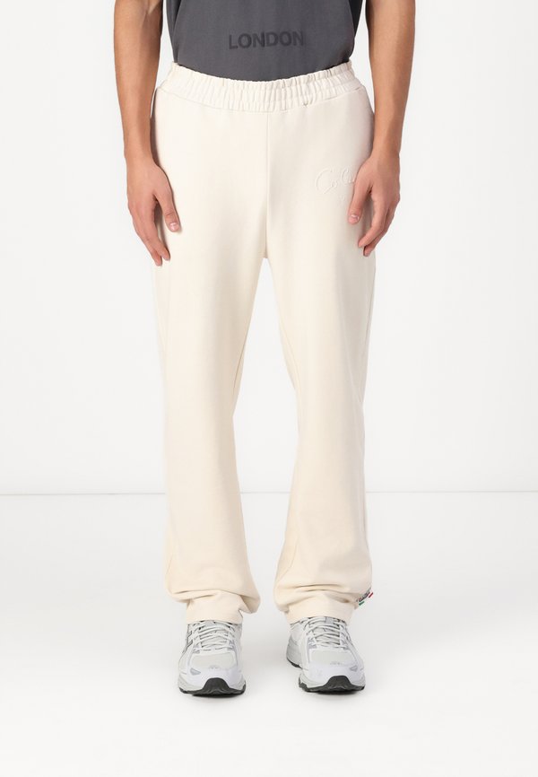 JOGGPANTS - Tracksuit bottoms - beige