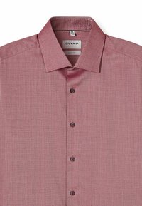 Red patterned shirt with a button-up design, featuring a spread collar and five buttons, made of textured fabric. Label reads "OLYMP Body Fit."