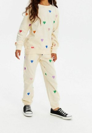 The New, Pantalon de survêtement - white