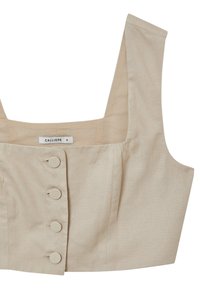 Top corto beige con scollatura quadrata, dotato di chiusura frontale con bottoni e una texture morbida simile al lino. L'etichetta riporta "CALLIOPE S."