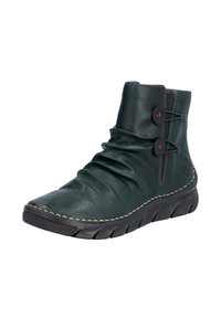 Botte en cuir vert foncé à la cheville avec texture ruisselante, accents de boutons rouges et semelle courbée pour la flexibilité. Présente des coutures contrastées.