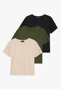 Drei kurzärmelige T-Shirts gestapelt: ein beiges, ein olivgrünes und ein schwarzes, aus weichem Stoff mit lässiger Passform und runden Ausschnitten.