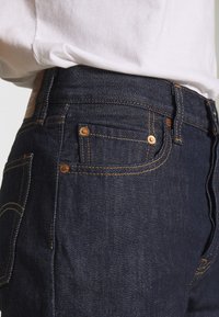 Levi's® 501® FOR WOMEN - Calças de ganga de perna direita - across a plane