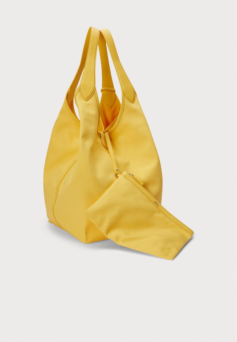 Yellow fabric tote bag with rounded, dual handles and a matching zippered pouch. Smooth texture, minimalistic design, spacious interior.