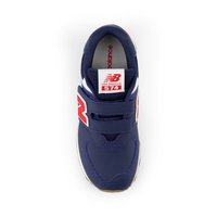 Marineblaue Sportschuhe mit Klettverschluss und weißen Akzenten. Verfügt über einen gepolsterten Schaft und eine strukturierte Sohle. Rotes "N"-Logo und sichtbare Dämpfung.