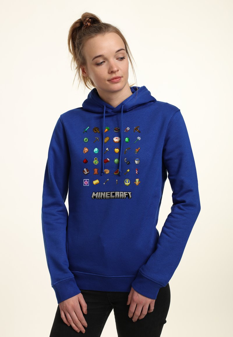 Sudadera azul con iconos de arte en píxeles de Minecraft en la parte frontal, que incluyen herramientas y alimentos, con capucha ajustable y puños acanalados.