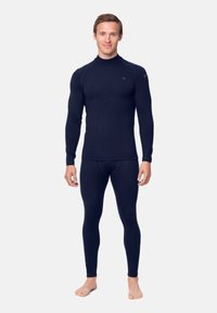 Navy Thermo-Unterwäsche Set aus weichem, geripptem Material mit hohem Kragen, langen Ärmeln und figurnaher Passform für optimale Isolierung.