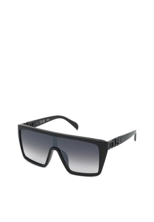Lunettes de soleil rectangulaires noires oversize avec verres dégradés foncés et marquage "TOUS" sur les branches, présentées sur fond blanc.
