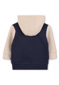 Sweatshirt à capuche avec une capuche et des manches beiges, corps bleu marine. Comprend des poignets et un ourlet côtelés, une texture douce et un schéma de couleurs contrastantes.