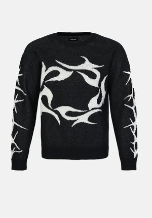 Schwarzer Strickpullover mit weißen, wirbelnden abstrakten Mustern auf der Vorderseite und den Ärmeln. Verfügt über einen runden Ausschnitt und gerippte Bündchen.