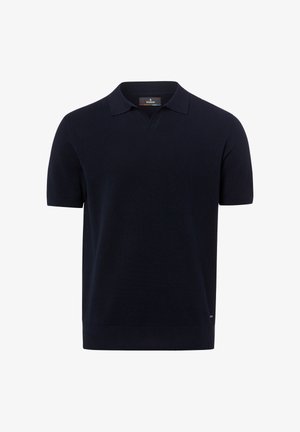 Schwarzes Poloshirt mit kurzen Ärmeln aus strukturiertem Stoff, geripptem Saum und Bündchen sowie einem kleinen Markenlabel nahe dem unteren Saum.