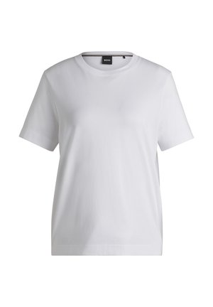White cotton t-shirt with a round neckline, short sleeves, and a relaxed fit. Features a small brand tag near the collar.