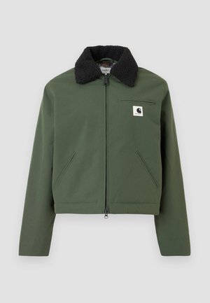 Green, cropped jacket with a black, fluffy collar. Features a zip closure, side and chest pockets, made from a smooth material.
