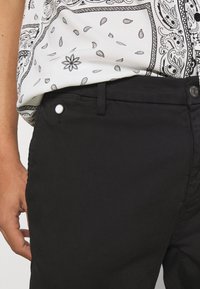 Replay Chinos - black