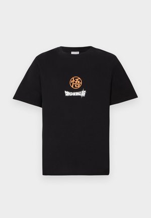 T-shirt en coton noir avec un logo circulaire orange et un imprimé en blanc "Dragon Ball" sur le devant. Design classique à col ras du cou.