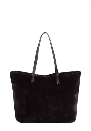 Bolso tote de piel sintética negra con dos asas de cuero negro. Diseño grande y abierto con textura suave, sin cierres visibles ni detalles adicionales.