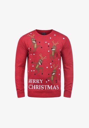 Rdeč pleten pulover z motivom štirih plešočih severnih jelenov in snežink. Na spodnjem delu bel napis »MERRY CHRISTMAS«. Okrogli izrez, dolgi rokavi.