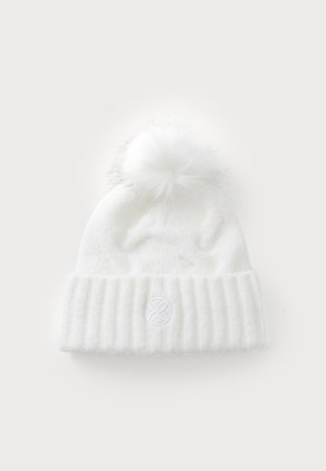 White knitted beanie with a ribbed cuff and a fluffy pom-pom on top, featuring a subtle embroidered logo on the front.