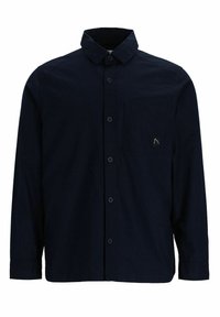 Camisa de algodón azul marino con cuello extendido, mangas largas, un bolsillo en el pecho y una pequeña etiqueta de logo en el bolsillo.